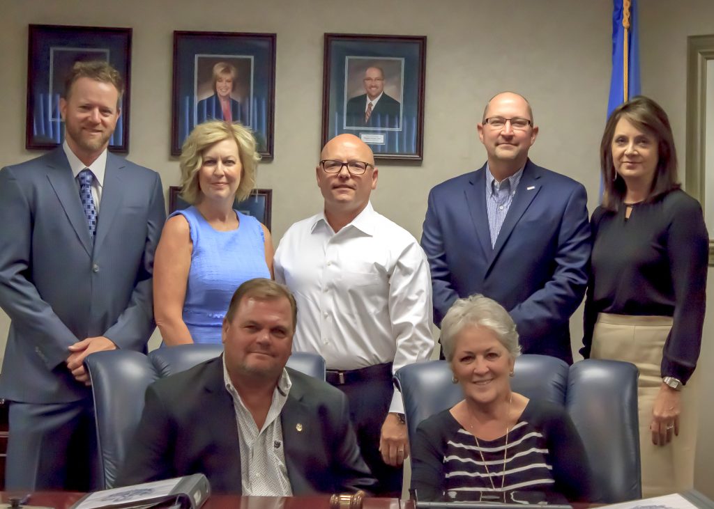 (back row, l-r): Secretary Ryan Franklin, Kim Hyden, Ray McQuiston, Bryan Cain and Paige Sherry; (seated, l-r): Vice Chair Curtis Morgan and Chair Marci Donaho