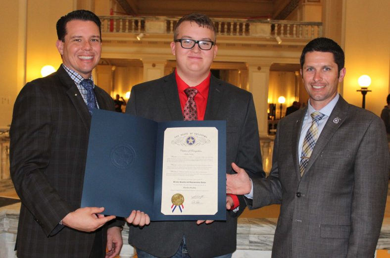 Pictured with Presley is Oklahoma State Senator Jason Smalley (left), R-Stroud, and Representative Zack Taylor (right), R-Seminole.