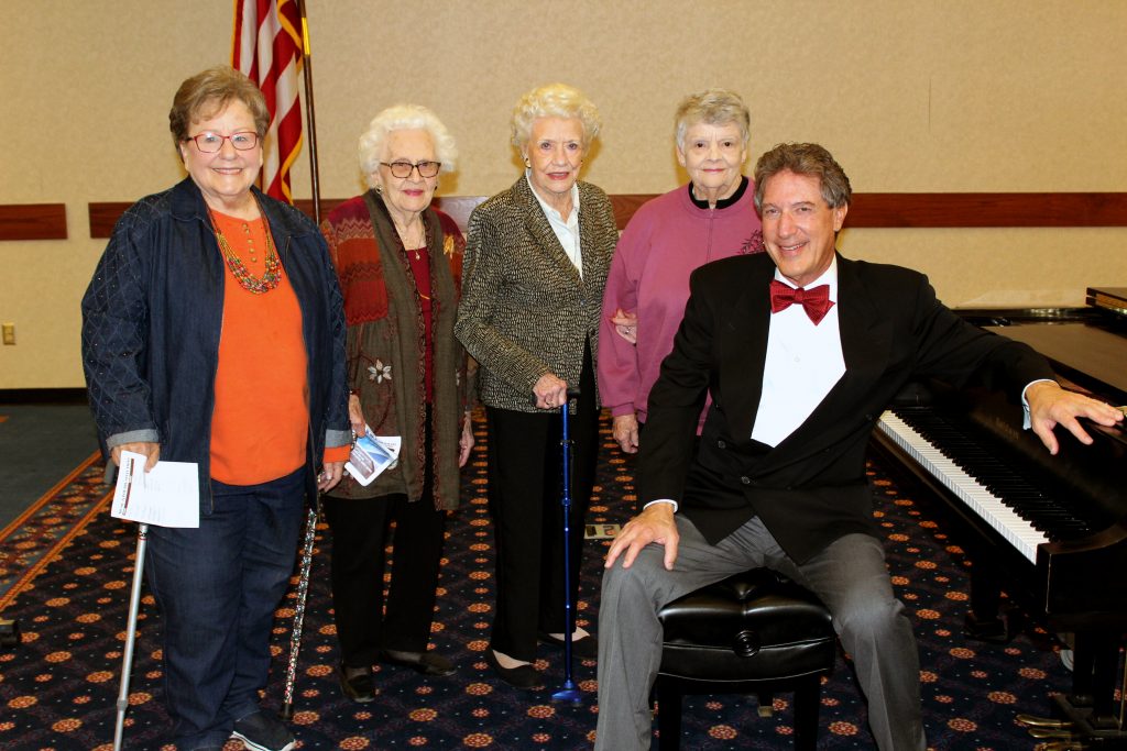 Joanne Baxter, Sharlene Hammons, Thelma Randolph and Bettie Conn (pictured left-to-right) of Seminole visit with pianist Peter Simon 