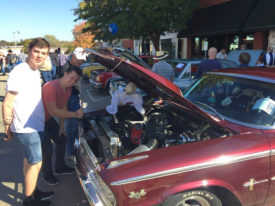 Students in front of Classic Car