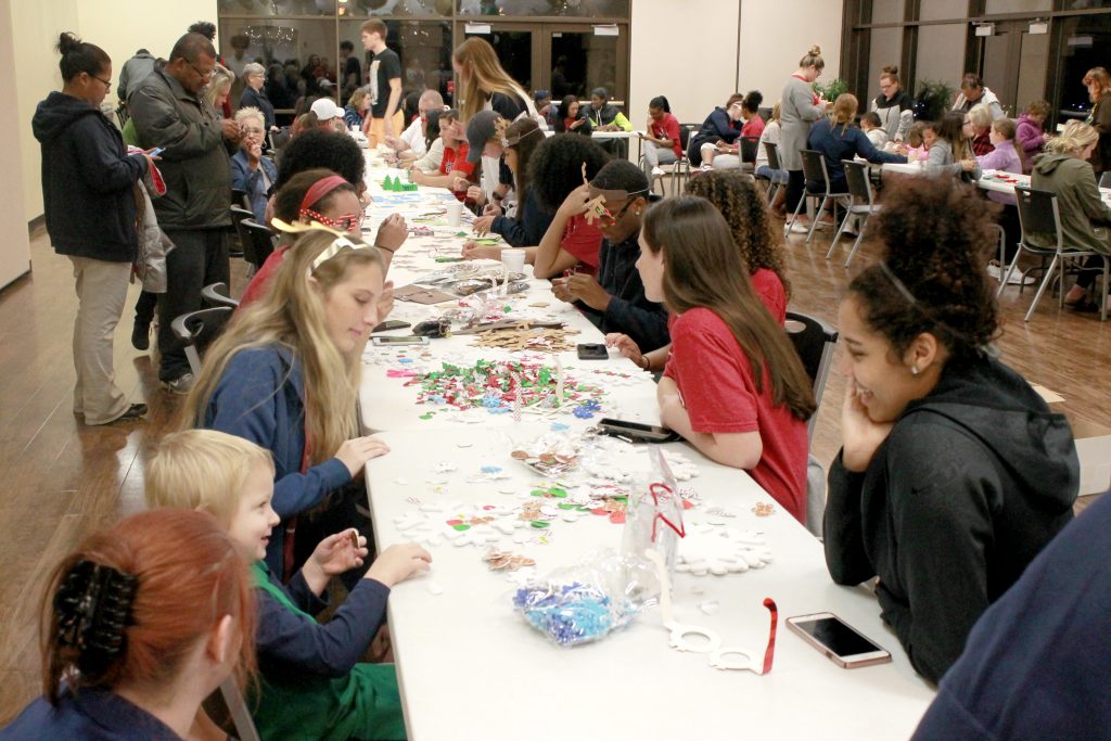 Local families enjoy making crafts with SSC athletes