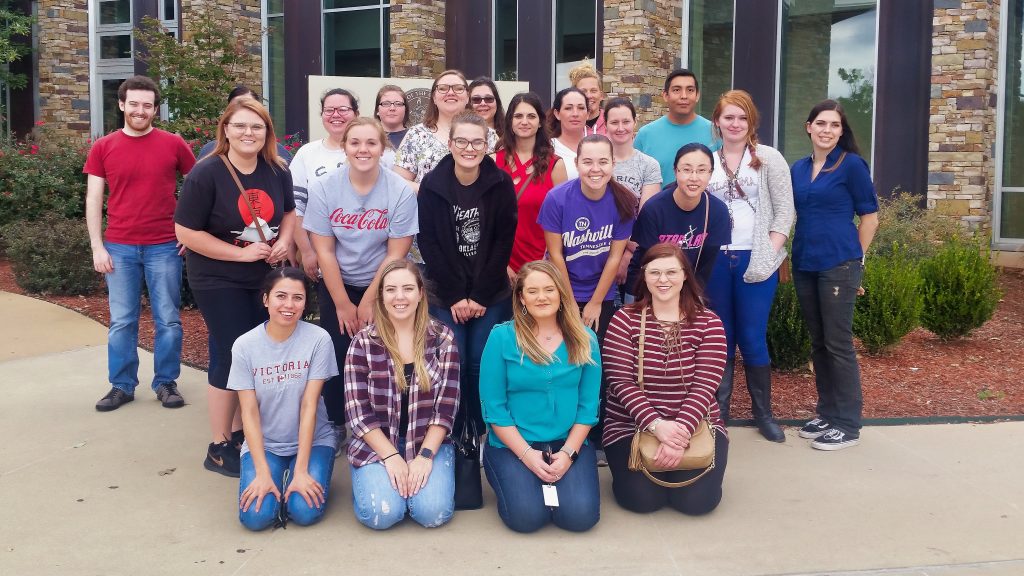 Seminole State College/Gordon Cooper Technology Center Medical Laboratory Technology students pose outside of the Chickasaw Nation Medical Center in Ada