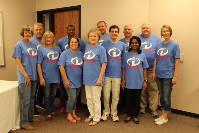 Pictured left to right are: (back row) Stephen Brooks, Mack Chambers, Shane Marshall, Michael Murray and David Cobb; (front row) Robin Tyler, Dianna O’Connell, Rachel Barker, Lana Reynolds, Andrew Davis, Nilmini Senaratne and Kim Pringle