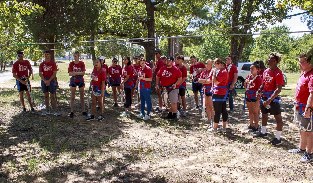 Seminole State College President’s Leadership Class students learn proper safety techniques before beginning the high course challenge at St. Crispin’s Lodge on Thursday, August 30.