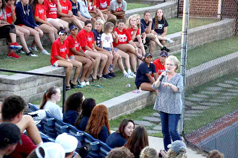  President Reynolds welcome athletes.