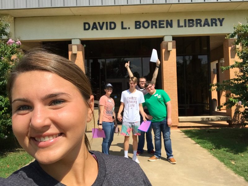 Cami Sosbee, Wewoka; Cattie Lesley, Okemah; Dylan Thomas, Shawnee; Charles Presley Jr., Seminole; and Anthony Weeks, Wetumka take a selfie in from of the Boren Library.