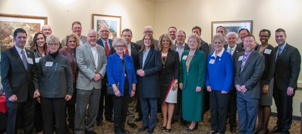 A delegation of community and campus leaders representing Seminole State College