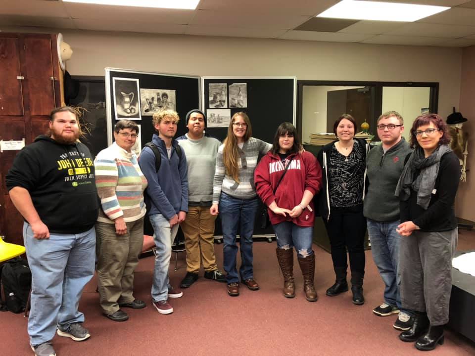 Students standing for a photo