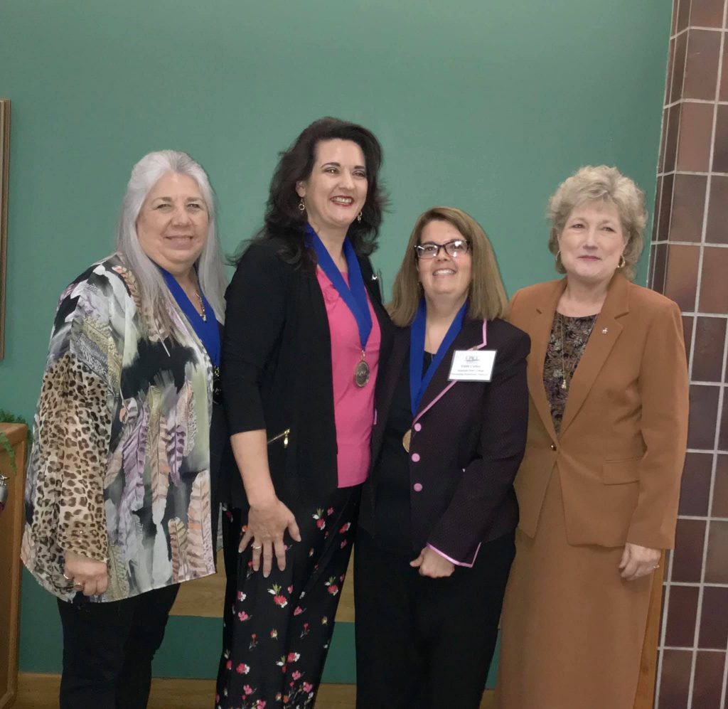 SSC President Lana Reynolds (right) stands by SSC’s 2019 Outstanding Employees at the Oklahoma Community Colleges Association annual conference Oct. 4. The award winners, pictured from left to right, are Administrative Assistant to the Vice President for Academic Affairs Robin Crawford, History Professor Marta Osby and Financial Aid Specialist Edith Cathey. 