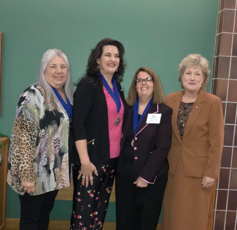 SSC President Lana Reynolds (right) stands by SSC’s 2019 Outstanding Employees at the Oklahoma Community Colleges Association annual conference Oct. 4. The award winners, pictured from left to right, are Administrative Assistant to the Vice President for Academic Affairs Robin Crawford, History Professor Marta Osby and Financial Aid Specialist Edith Cathey.