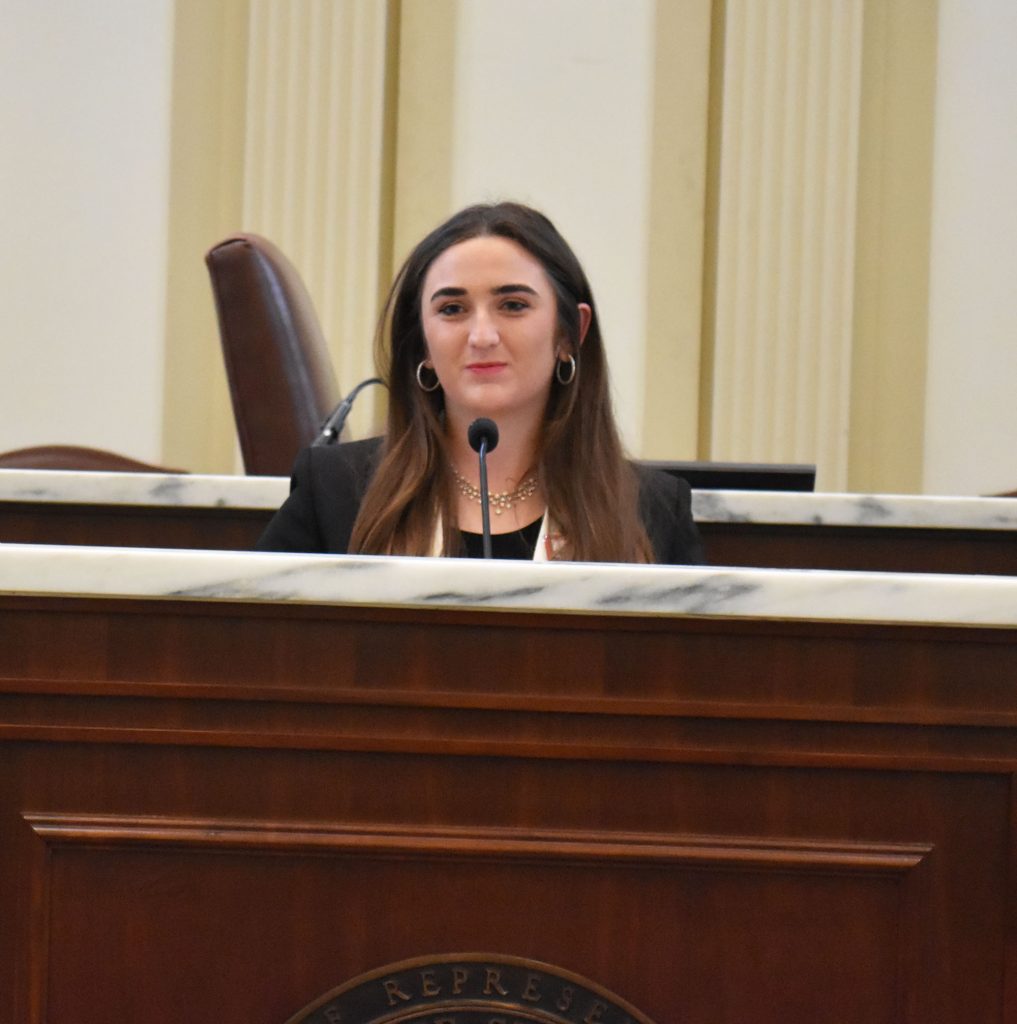 Kimberly Cotter addresses legislators about how higher education has impacted her life at the State Capitol.