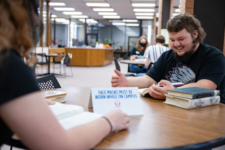SSC students study at a table in the Boren Library.