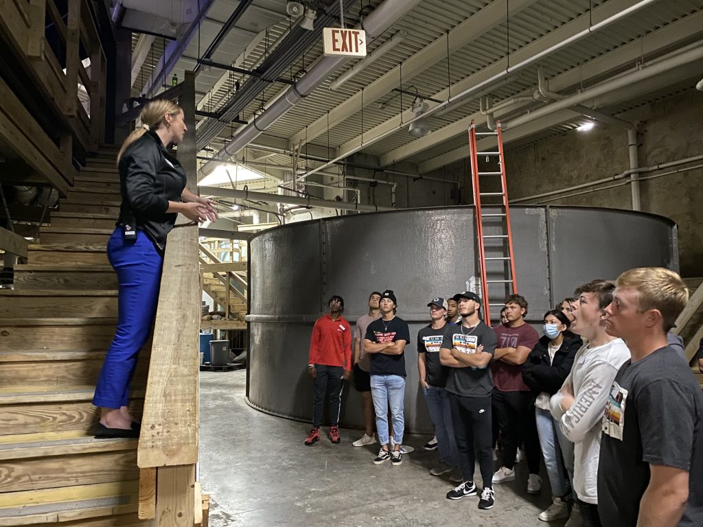 Educational Specialist Alyssa Rodriguez discusses the day-to-day work of caring for aquatic life with Seminole State College President’s Leadership Class.