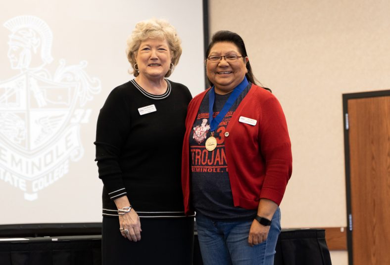 President Reynolds (left) recognizes Tina Morris (right) as this year’s Outstanding Support Staff Member at the OACC Support Staff Conference on Oct. 29 at Seminole State College.