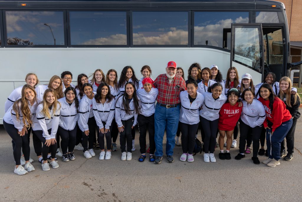 The women’s soccer team poses in front of the bus before making their departure on Nov. 12. The team enters the tournament as the number two seed. This marks their third consecutive year to compete in the NJCAA Division I National Tournament.