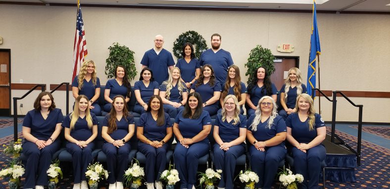 Pictured are the Nineteen nursing students that participated in the pinning ceremony at the Enoch Kelly Haney Center.