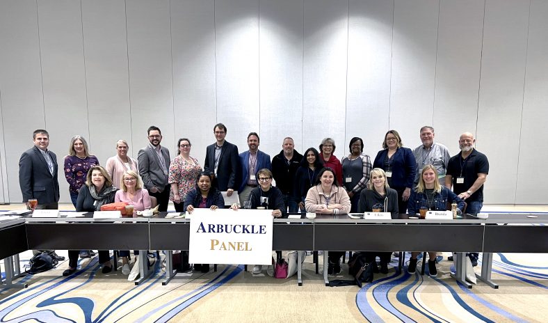 Professor of Psychology Christal Knowles (first row, third from left) poses alongside other members of the Arbuckle Panel at the 2021 Oklahoma Academy Town Hall on mental wellness.
