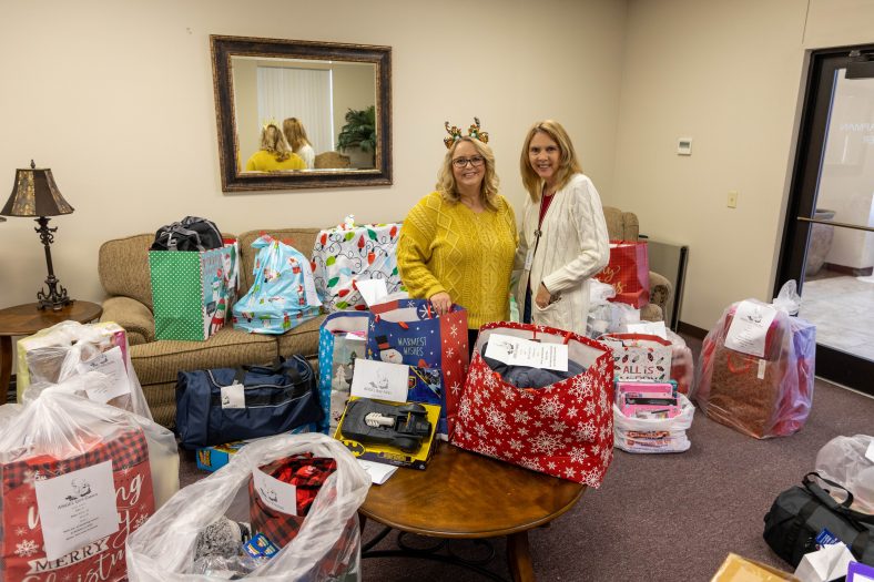 SSC Classified Staff President Stacey Foster (left) and Administrative Assistant to the Vice President for Student Affairs Toni Wittmann (right) ready gifts for the Angel Tree program.