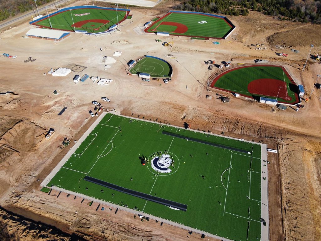Pictured is an aerial view of the Brian Crawford Memorial Sports Complex under construction. The aerial shows three new baseball fields, a new soccer field and the Avedis Adaptive Field.