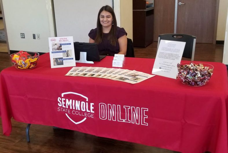 Online Degree Office Student Navigator Laura Votaw informs perspective students of Seminole State College’s online degree programs at a recent event.