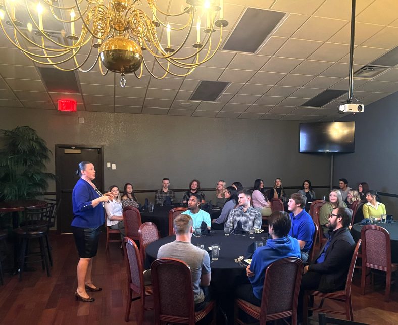 Etiquette expert Carey Sue Vega explains business etiquette to Seminole State College President’s Leadership Class students at the Shawnee Country Club on March 1.