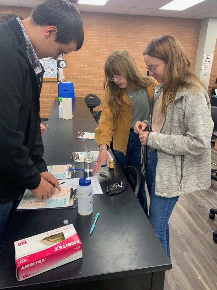 Pictured (left to right): Chandler students Ethan Stone, Emma Cummings and Sadie Sherman work as a team to analyze water samples during the Environmental and Natural Resource competition at the SSC FFA Interscholastic Contest on April 14. Chandler placed 3rd out of 13 teams.