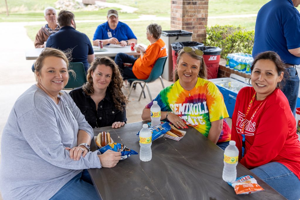 Members of the Seminole State College Business Office staff (pictured left to right) Bobbie Sampley, Hannah Odum, Jessica Johnson and Shirlene Davidson sit at a table and enjoy Friday’s Employee Appreciation event sponsored by the SSC Educational Foundation.