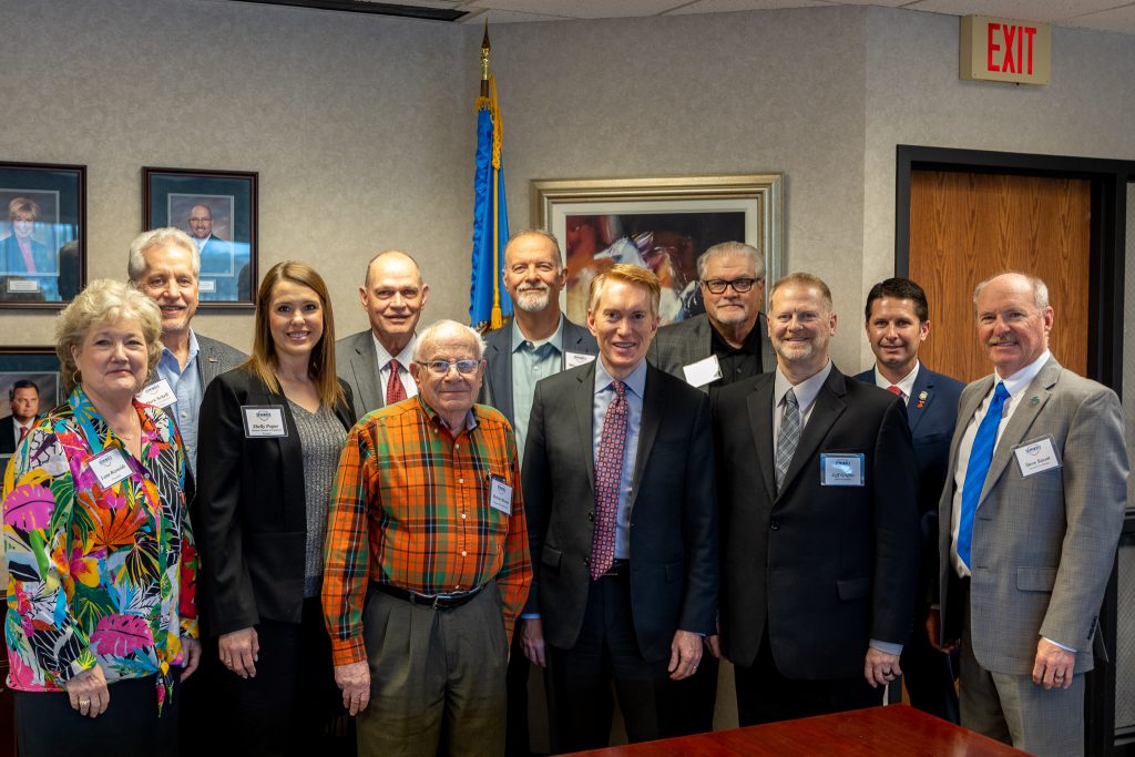 Community leaders posing for a photo after the Leadership Luncheon with Senator James Lankford. Pictured left to right: SSC President Lana Reynolds, Security State Bank President Mark Schell, Chamber President Shelly Pogue, Superintendent of Schools Dr. Bob Gragg, Moran Oil Enterprises Owner Melvin Moran, BancFirst President Mike Mariano, U.S. Senator Lankford, Rural Business and Resources Consultant Larry Smith, Mayor Jeff Griffin, State Senator Zack Taylor and City Manager Steve Saxon.