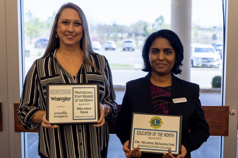 Staff Member of the Month Melinda Sims and Faculty Member of the Month Dr. Nilmini Senaratne pose with their awards after being recognized at the Seminole Chamber of Commerce Forum April 14.