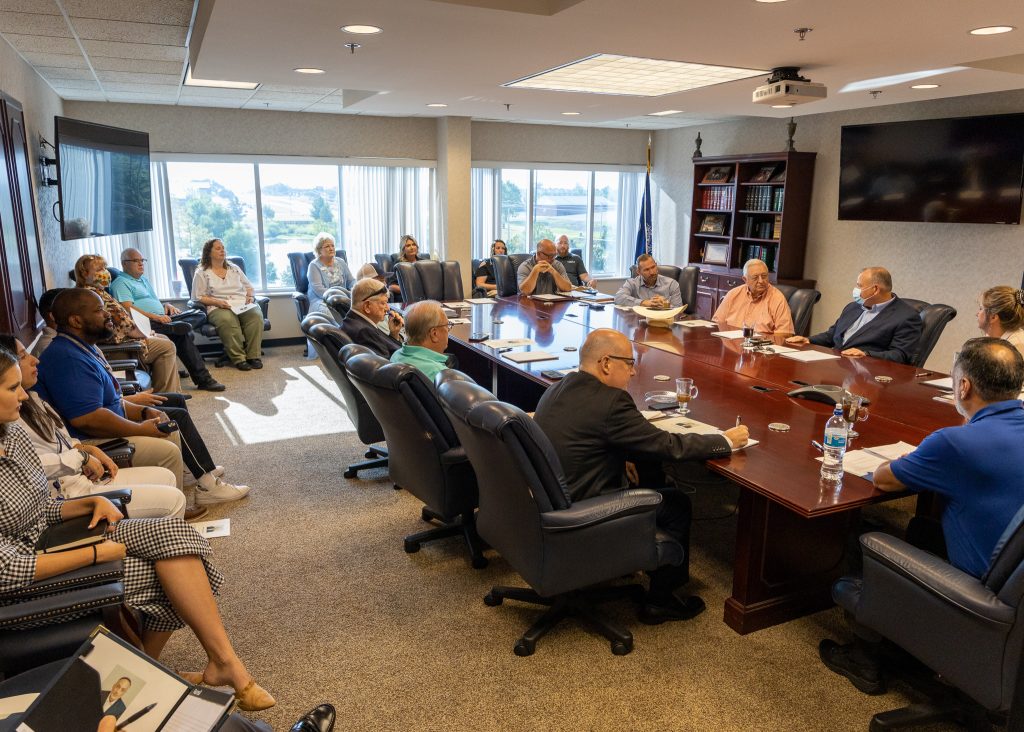 Pictured, Various disaster relief agency representatives and community leaders meet in the Seminole State College Haney Center Board Room to discuss ways to better coordinate and complement services offered to Seminole following the May 4 tornado, as well as how to improve all response efforts following disasters.