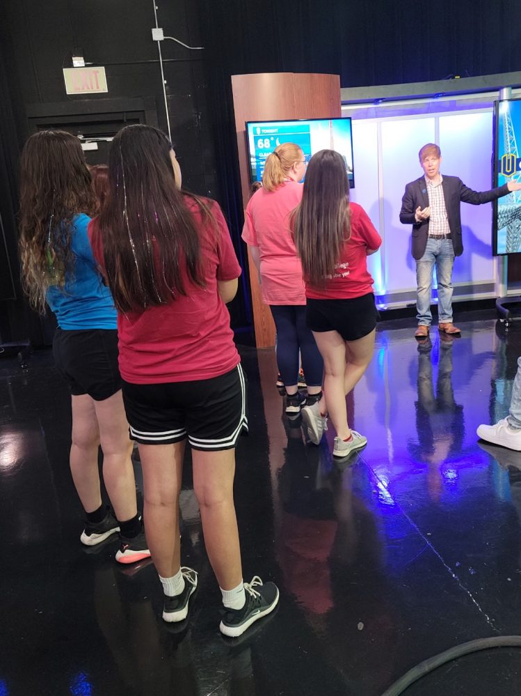University of Central Oklahoma Mass Communications Professor Mark Scott speaks with GEAR UP students about careers in broadcast journalism during a recent summer camp.