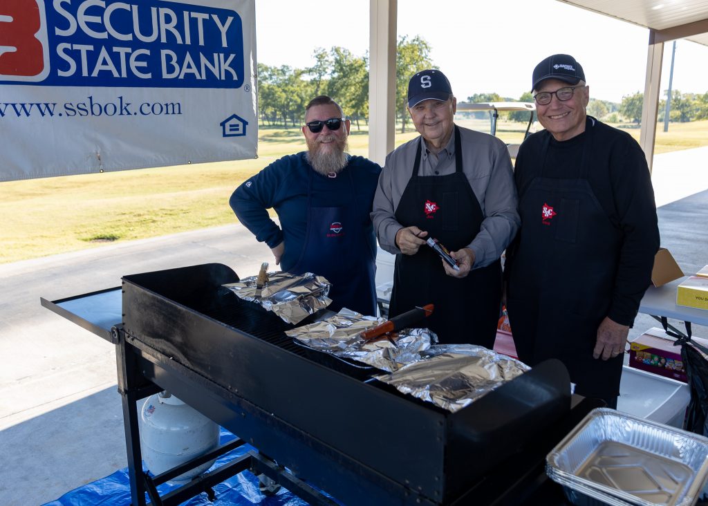 Pictured (left to right) Vice President for Student Affairs Dr. Bill Knowles, SSC Educational Foundation Trustees Jim Hardin and Doug Humphreys prepare hot dogs and brats for participants at the event.