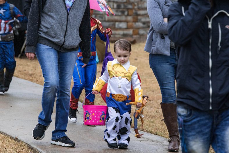 Children and parent from the Seminole community attend trick or treat trail in various costumes.