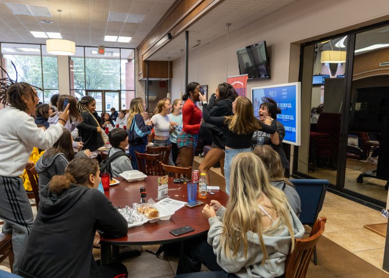 SSC Women's Soccer Team members celebrate during the selection show where it was announced via livestream that the Trojans received an at-large bid for the 2022 NJCAA D1 Women’s Soccer Championship.