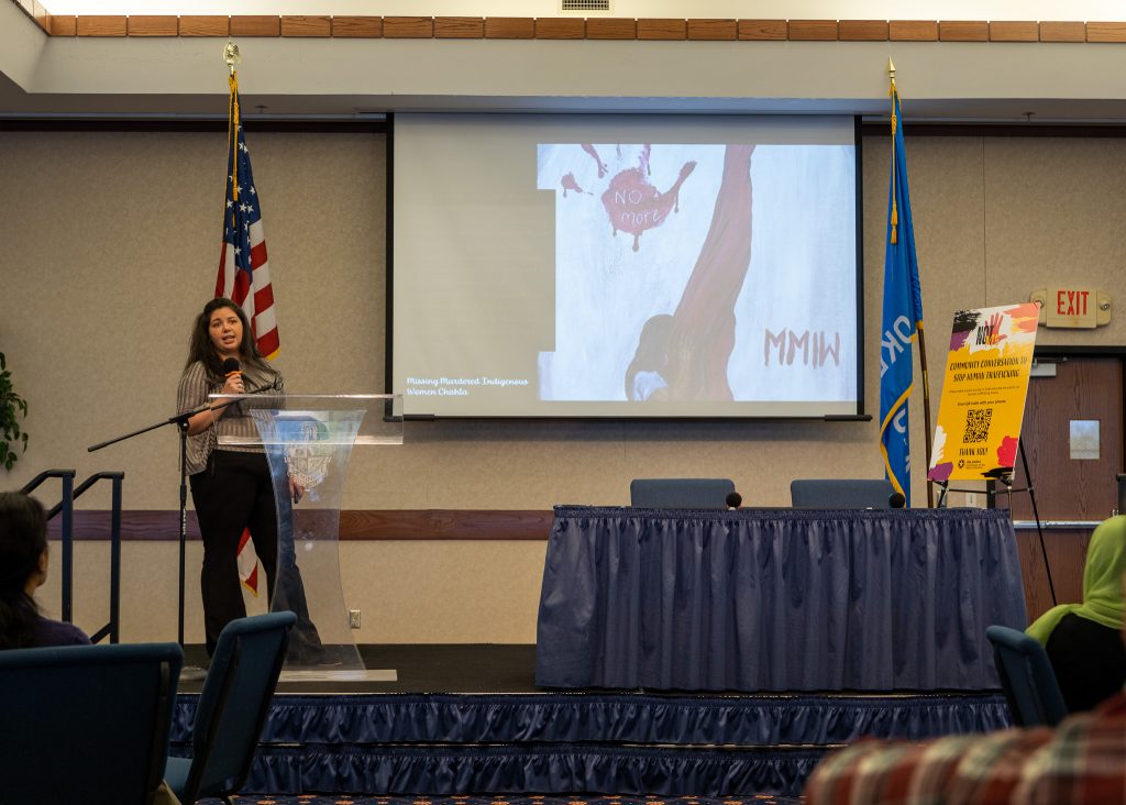 Karrisa Hodge addresses the crowd at a panel on human trafficking awareness on Jan. 12 during the Seminole Chamber of Commerce forum luncheon.