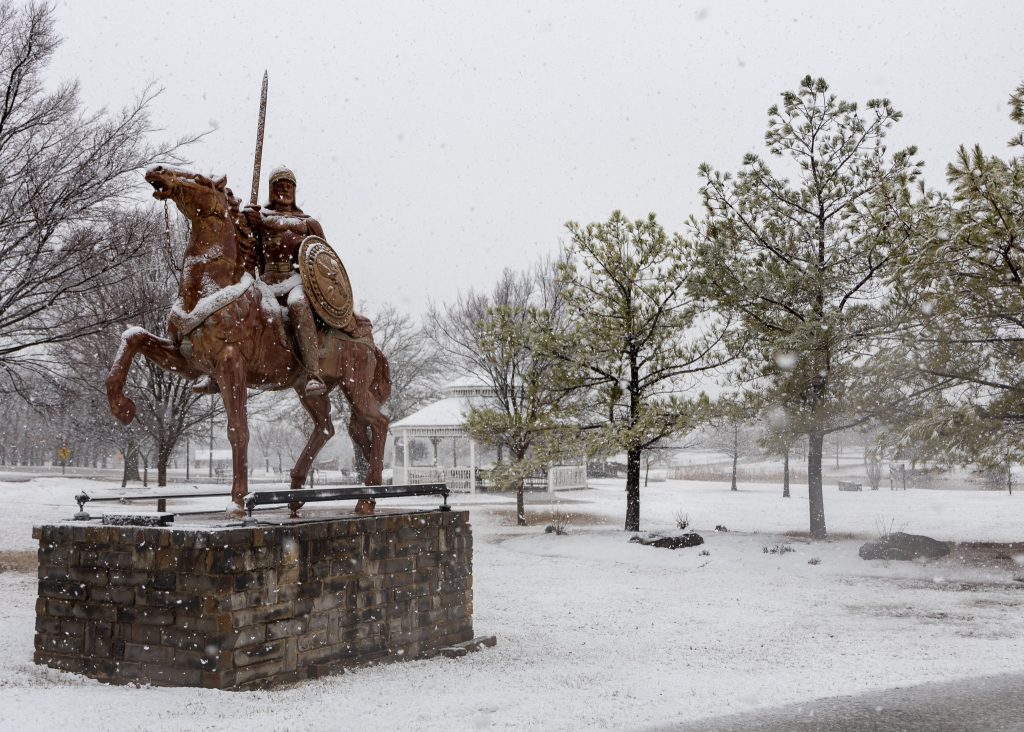 The Trojan statue is pictured gathering snow as winter weather moved into the area on Tuesday, Jan 24.