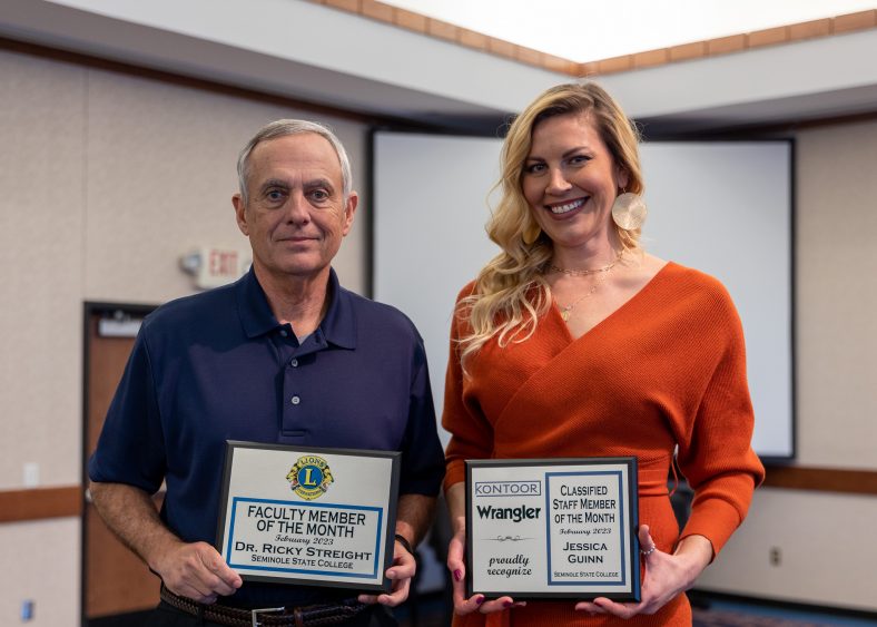 Pictured, left to right, Assistant Professor of Mathematics Dr. Ricky Streight and Admissions and Record Specialist Jessica Guinn pose for a photo with their awards for “Faculty Member of the Month” and “Staff Member of the Month.”