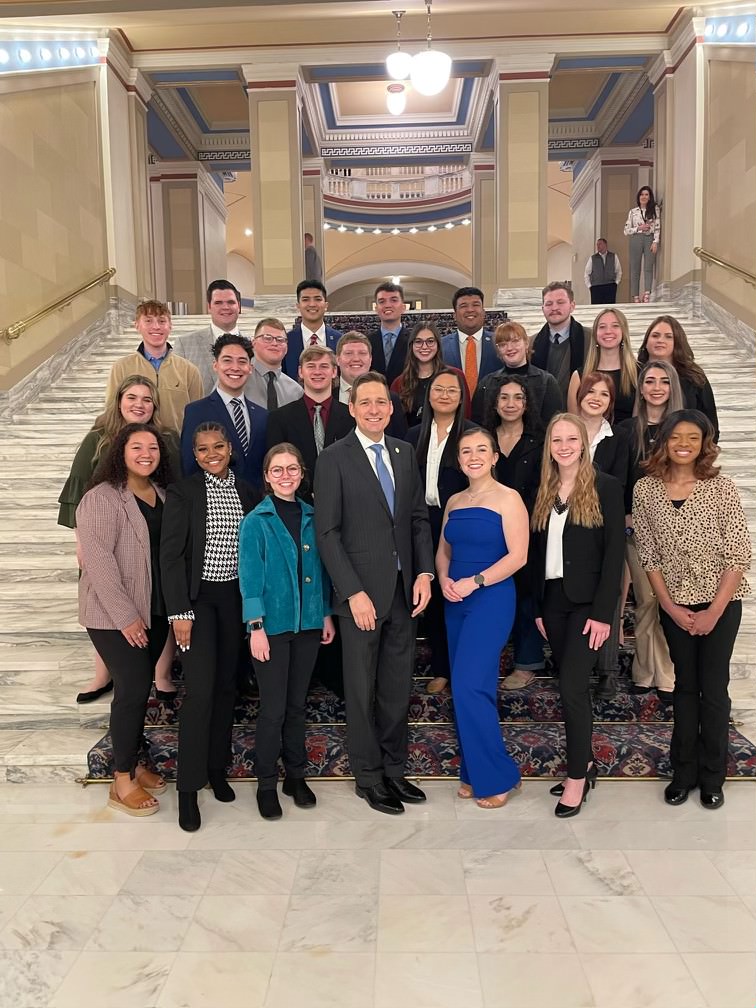 The 2023 Nigh Academy Scholars pose for a photo with Lt. Governor Matt Pinnell (front row, center) while they toured the State Capitol on Feb. 7. 