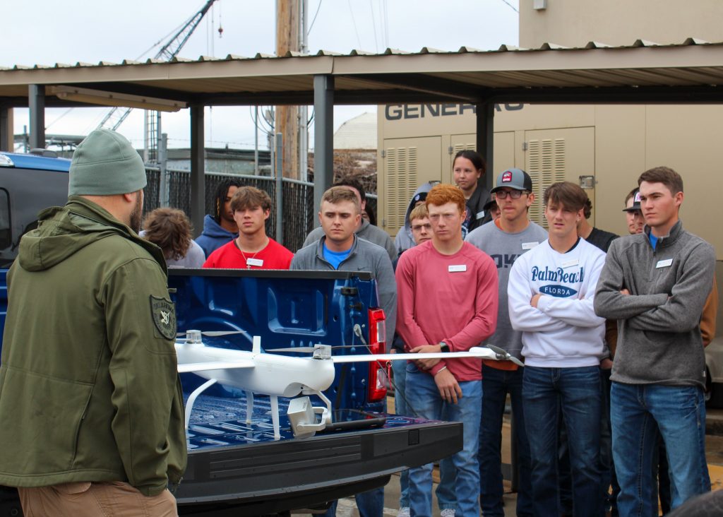 Agent Shaun Manes (left) demonstrated how OBN utilizes drones in investigations. PLC students also learned about the K9 program and heard from OBN Director Donnie Anderson, OBN Agents Anthony Moore, Dallas Lang, Attorney General Office Agents Christopher Culbreath and Brent Green.