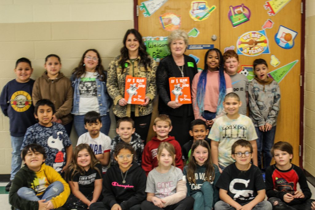 Seminole State College President Lana Reynolds and SSC President’s Leadership Class student Hailey Wallace, a sophomore from Wellston, are pictured reading “If I Ran the Zoo” by Dr. Seuss, to Mrs. Sonia Scott’s third grade class.