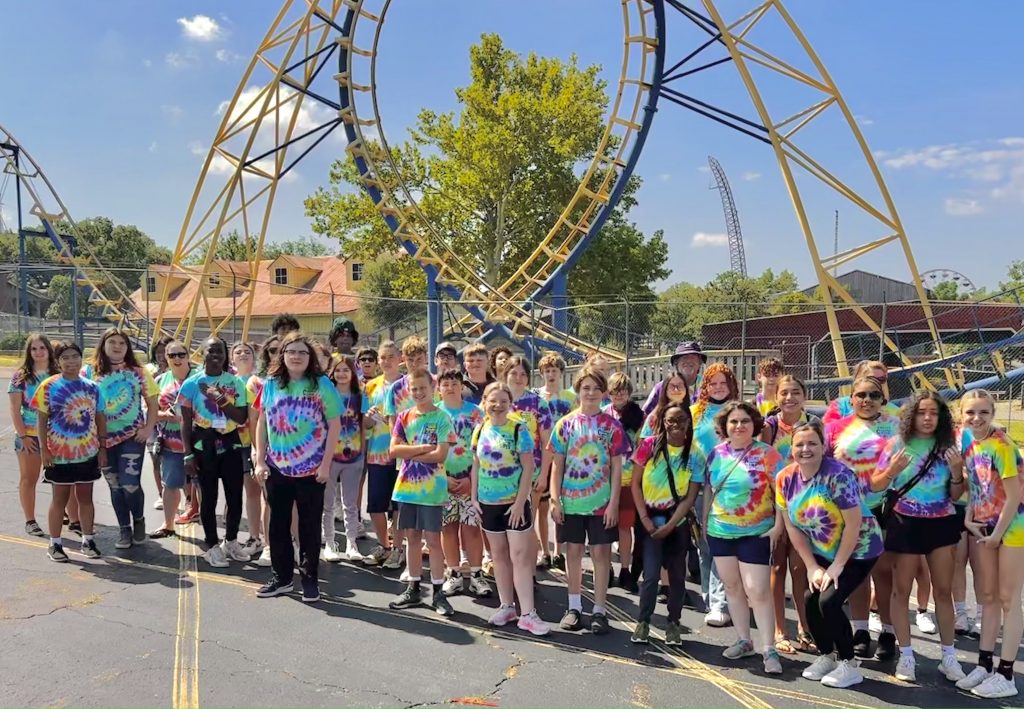 Eighth-grade students participating in the Seminole State College Talent Search/FOCUS federal grant programs Coaster Camp pose for a group photo during a visit to the Frontier City theme park in Oklahoma City.