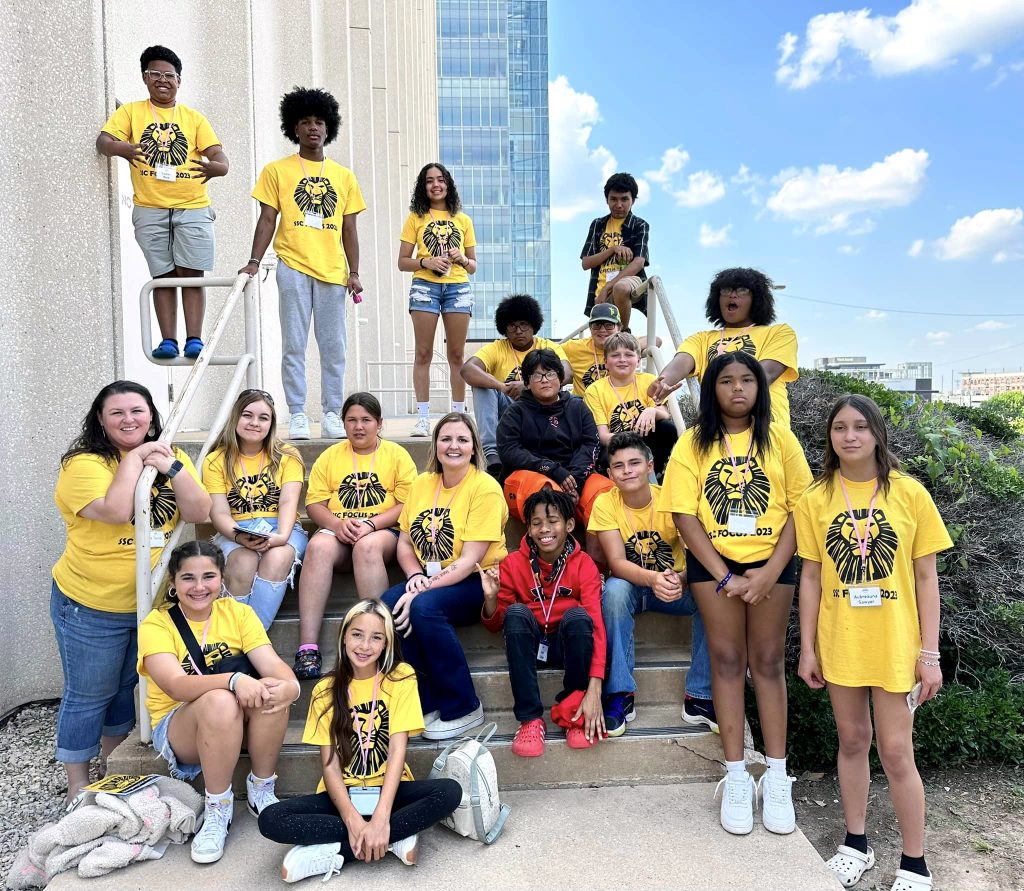  Seminole State College Talent Search/FOCUS federal grant program participants pose for a photo outside of the Lion King musical at the Tulsa Performing Arts Center.