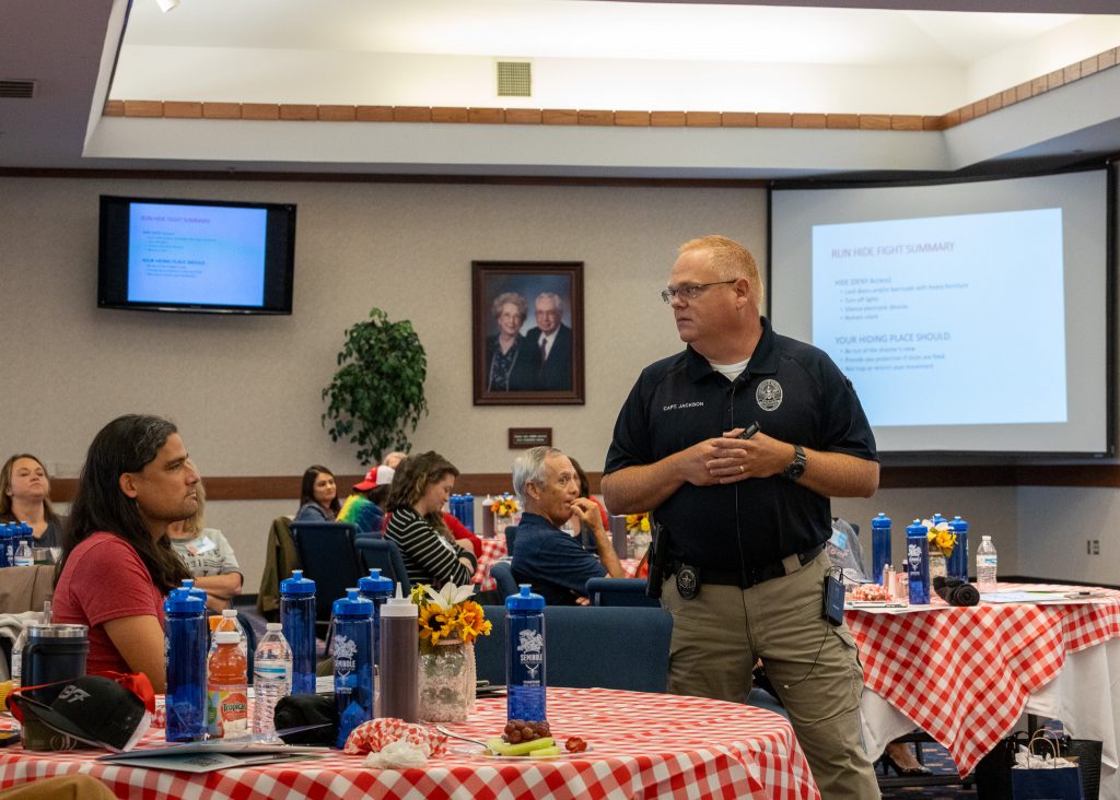 In this picture, Captain Dalton Jackson, of the University of Oklahoma Health Sciences Police Department, speaks to SSC employees about campus safety and what steps to take in an active shooter situation.
