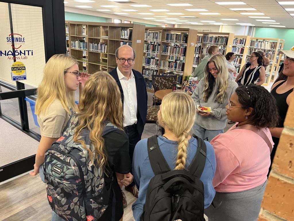 Pictured, prior to his presentation, Grann meets with SSC faculty and students at a reception in the Boren Library.