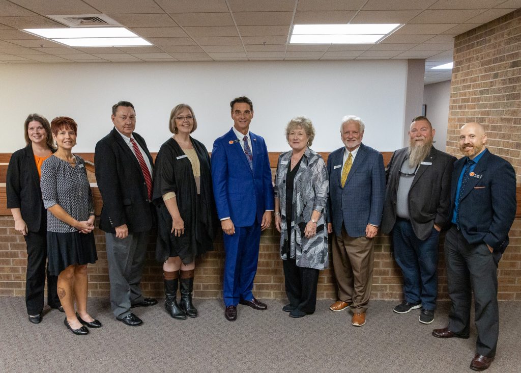 Pictured (left to right) are: Dr. Sarah Peters, ECU Associate Provost and Dean of Graduate Studies; Dr. Amanda Estey, SSC Vice President for Academic Affairs; Darrell Morrison, ECU Executive Vice President for Administration and Finance; Melanie Rinehart, SSC Vice President for Fiscal Affairs; ECU President Wendell Godwin; SSC President Lana Reynolds; ECU President Emeritus Hargrave; Dr. Bill Knowles, SSC Vice President for Student Affairs and Dr. Denver Stickrod, ECU Vice President of Enrollment Management.