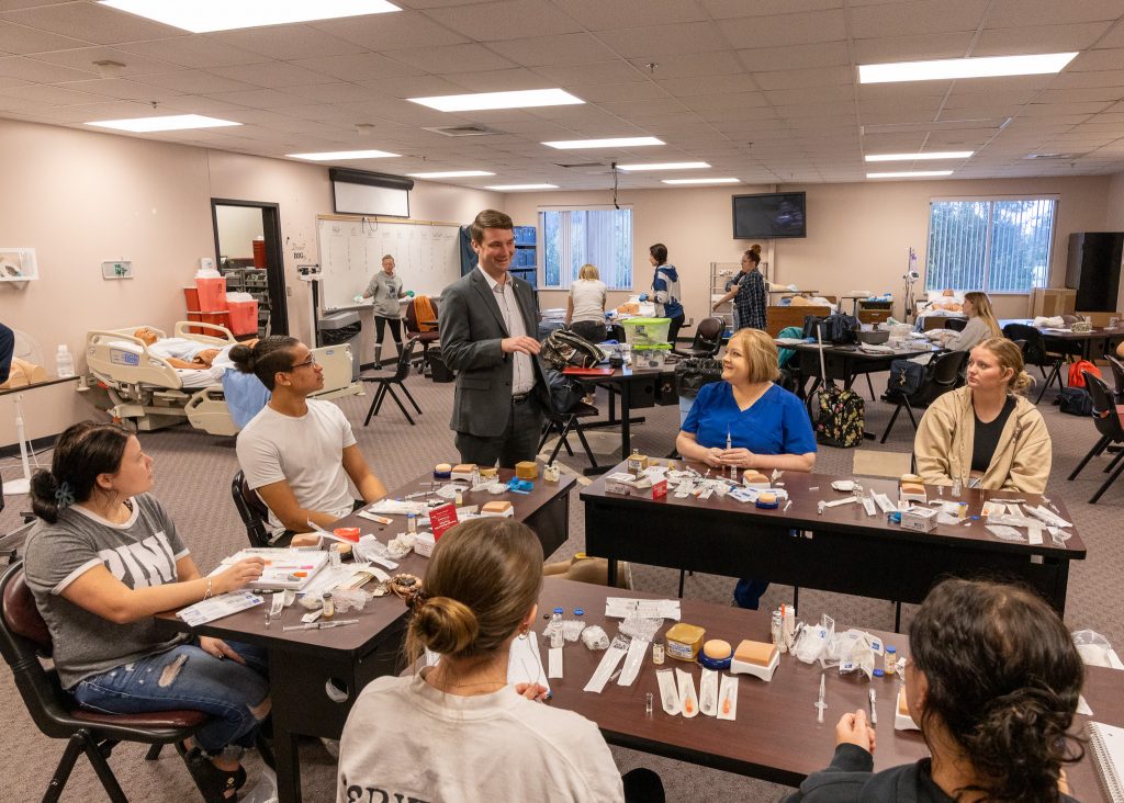 Pictured is Speaker Pro Tempore of the Oklahoma State House of Representatives Kyle Hilbert (R-Bristow) as he stopped in on a nursing class in the Haney Center. during his visit to the Seminole State College campus on Oct. 26.