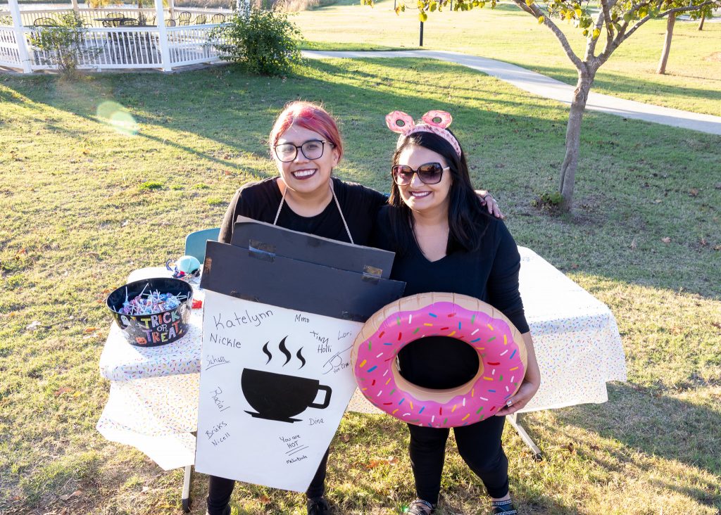 Online Degree Office Navigator Caitlin Brown (left) and Coordinator of Distance Education Laura Votaw (right), are pictured dressed as the duo of coffee and doughnuts.