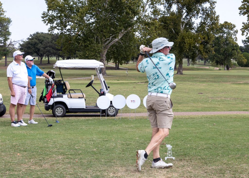 Pictured, SSC Rural Business and Resources Director Danny Morgan and SSC Educational Foundation Chair Lance Wortham look on as Seminole City Manager Steve Saxon tees off.