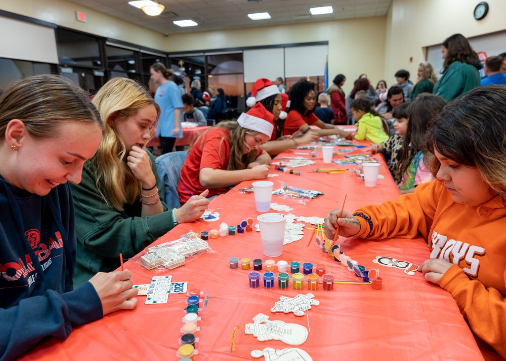 SSC students and community members are shown working on craft projects at last year's annual Night at the Lights event.