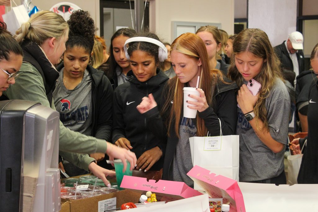 Goodie bags were provided by the Student Government Association and Seminole Social’s Sarah Contreras (pictured left) provided nutritional beverages to the team.